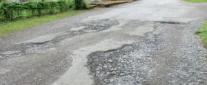 Rural residents suffering worse with potholes